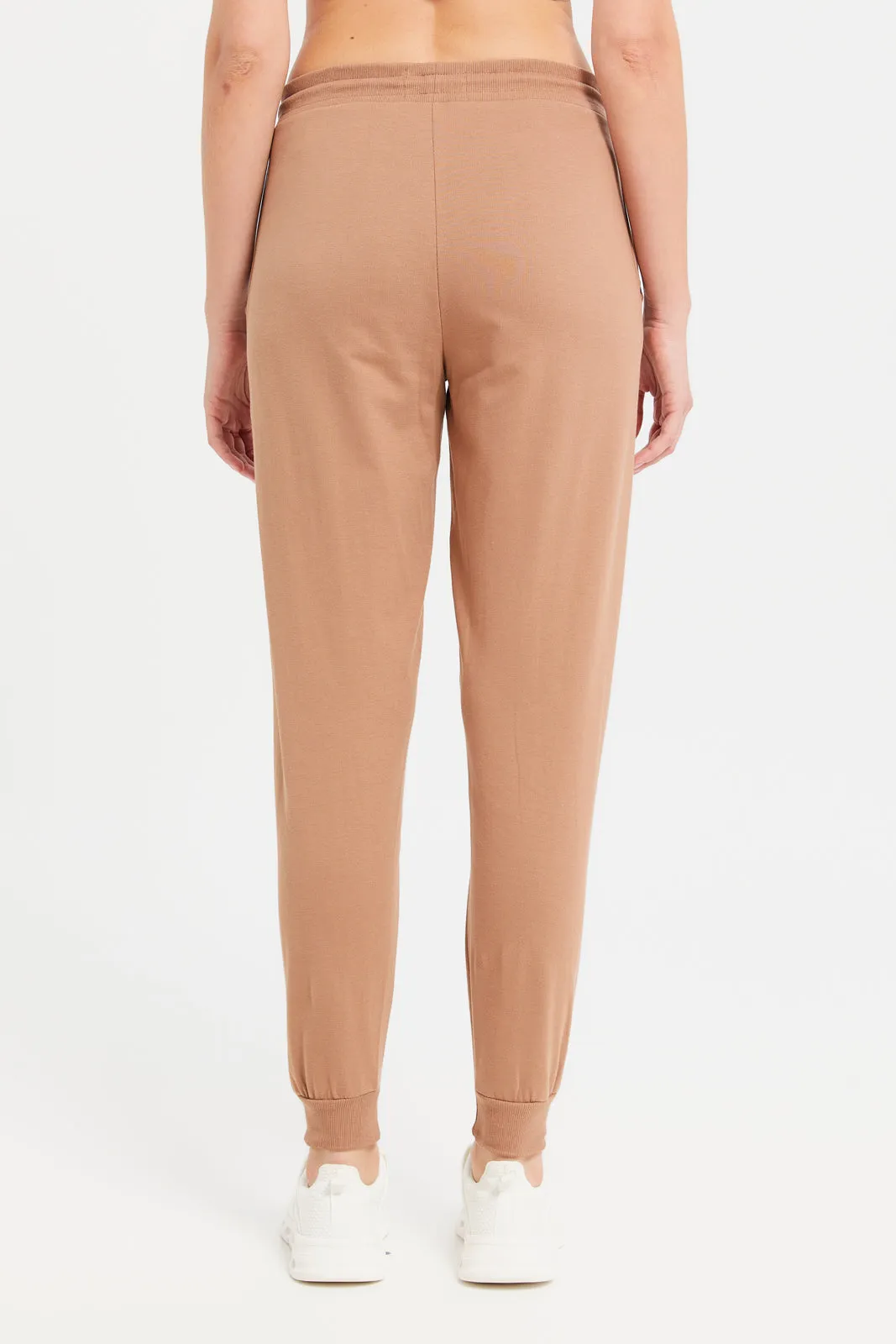 Women Rust Solid Jogger Pants With Pockets