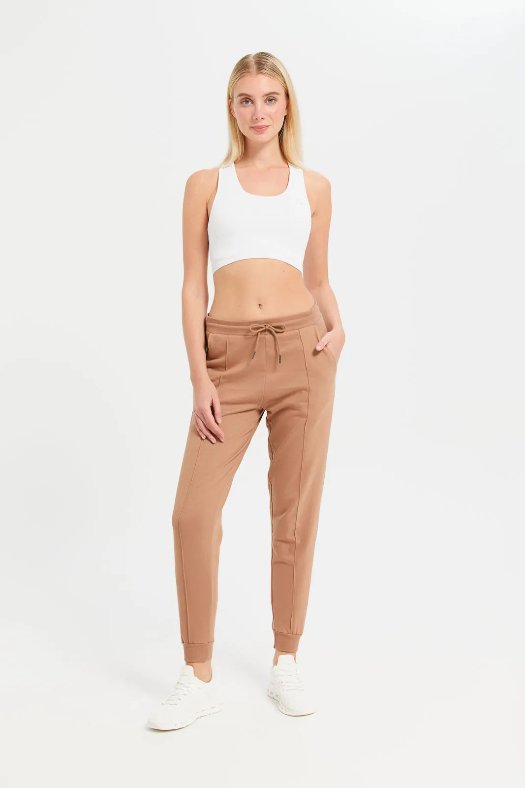 Women Rust Solid Jogger Pants With Pockets