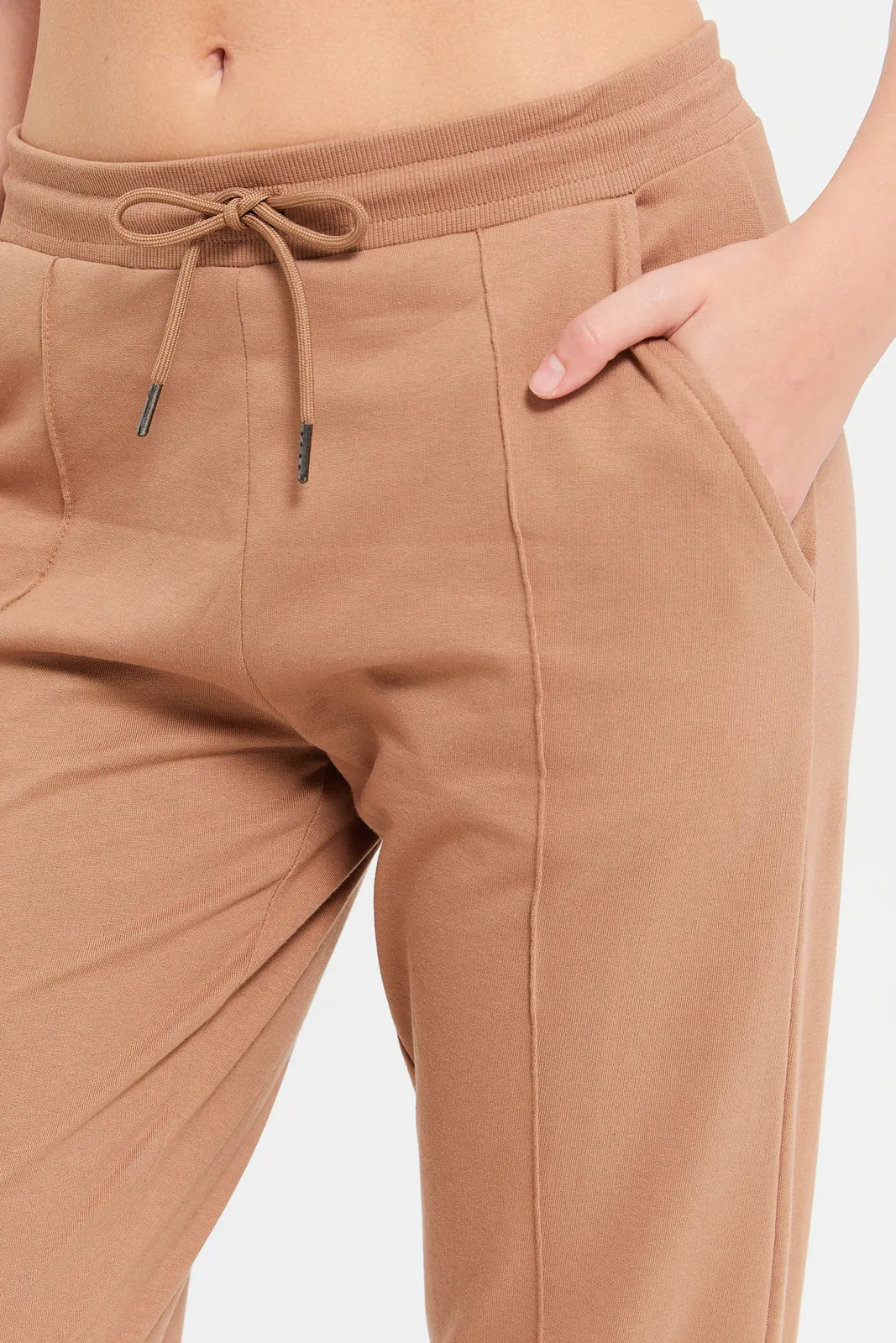 Women Rust Solid Jogger Pants With Pockets